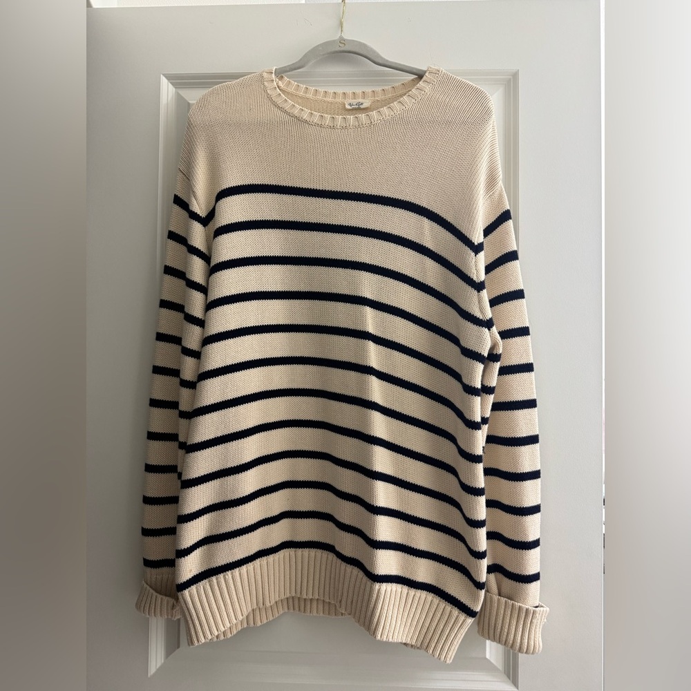 Cream oversized sweater from PacSun.
